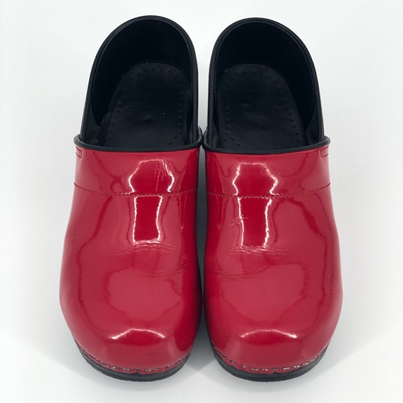 red patent leather clogs